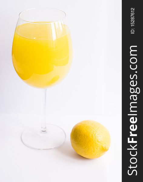 Lemon cocktail with lemon on white isolated background