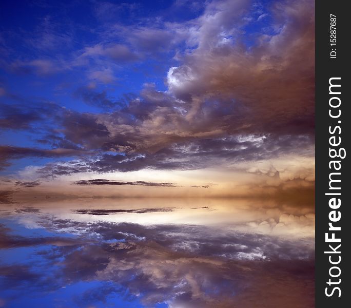 A beautiful cloudy sky with reflection. Abstract background.