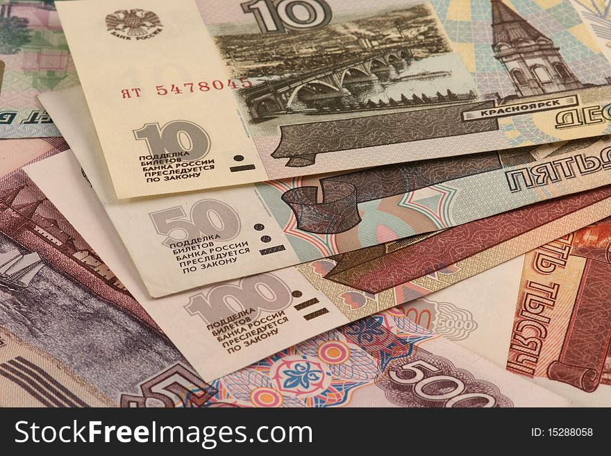 Russian roubles. Different banknotes on white background. Russian roubles. Different banknotes on white background.