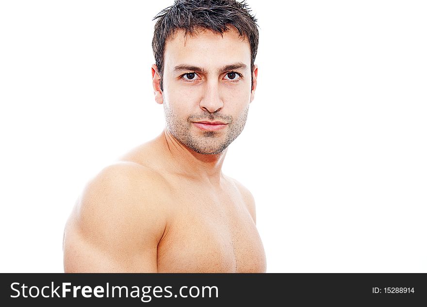 Bearded young man posing on white background