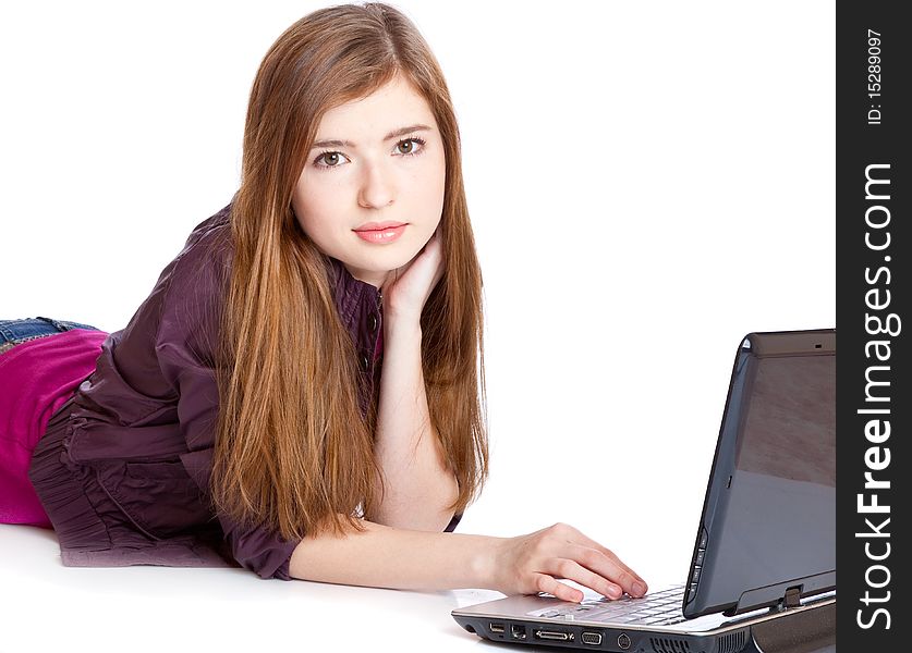 Girl on a floor with laptop