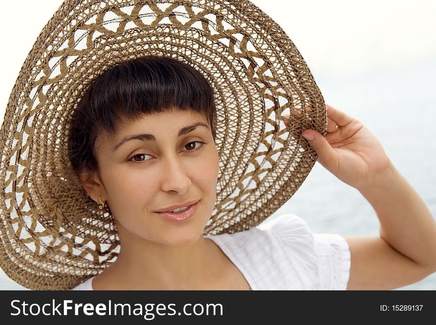 Close-up of the pretty young girl in the bonnet. Close-up of the pretty young girl in the bonnet