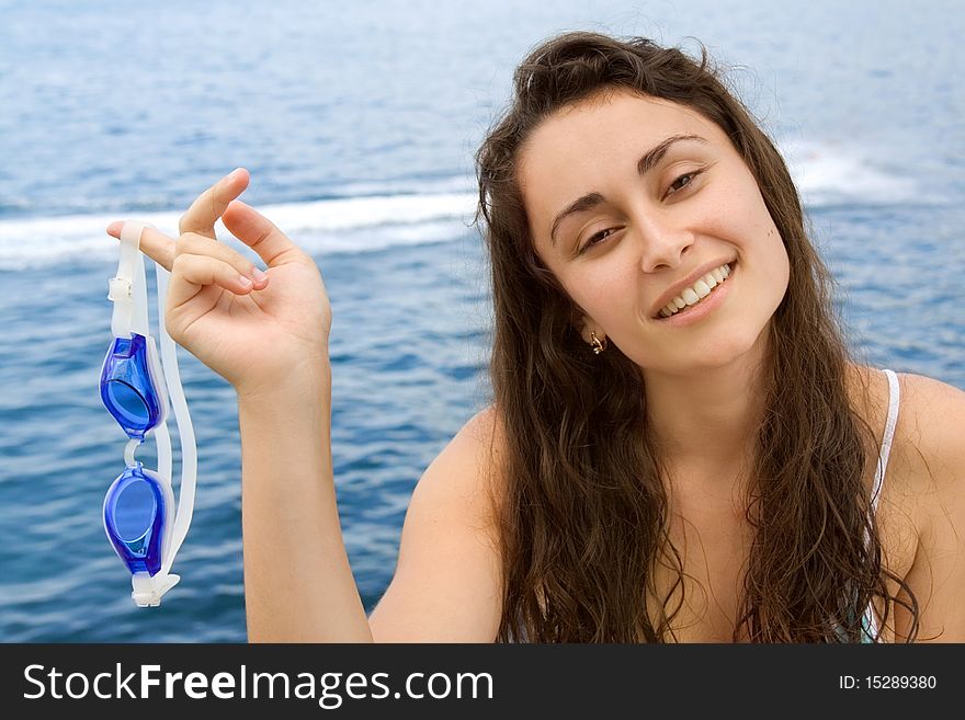 Young girl with swimming glasses