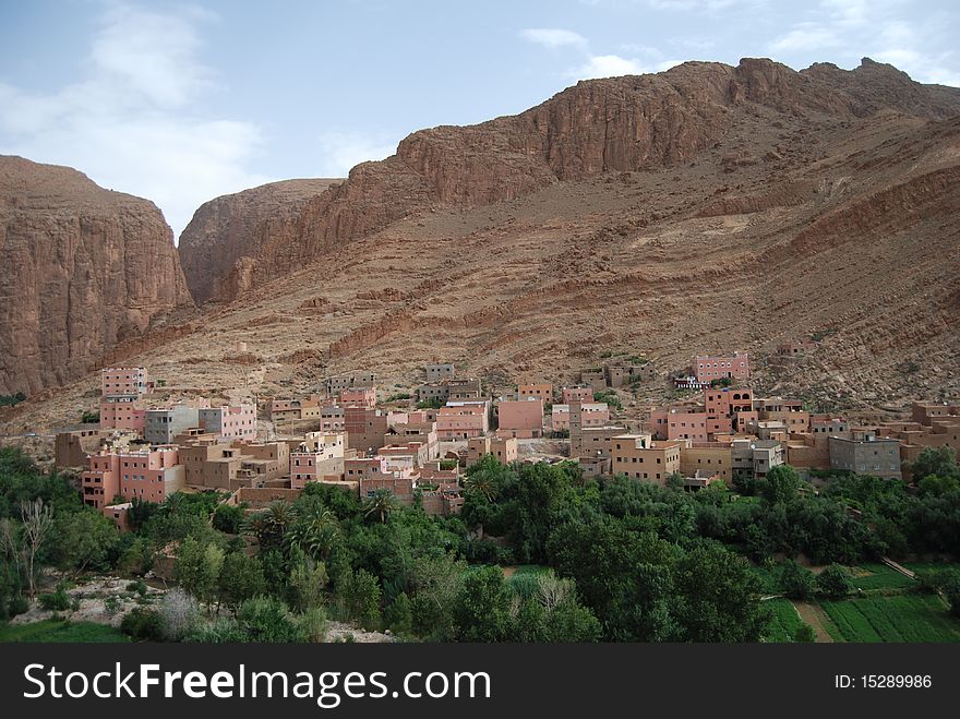 A village at the entrance to Todra gorge and a plantation of crops. A village at the entrance to Todra gorge and a plantation of crops