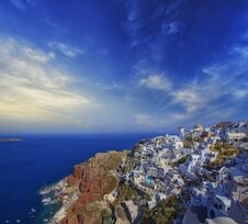 Blue And White Colours Of Oia City. Magnificent Panorama Of The Island Of Santorini Greece During A Beautiful Sunset In The Medite Stock Image Blue And White Colours Of Oia City. Magnificent Panorama Of The Island Of Santorini Greece During A Beautiful Sunset In The Medite Stock Image