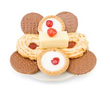 Plate With Sweets And Cookies Royalty Free Stock Photos