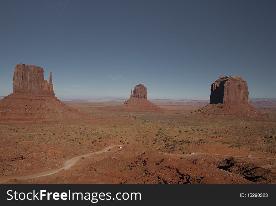 Merrick Butte And The Mittens At Sunset, Monument Valley In The Navajo Tribal Park, Arizona, USA