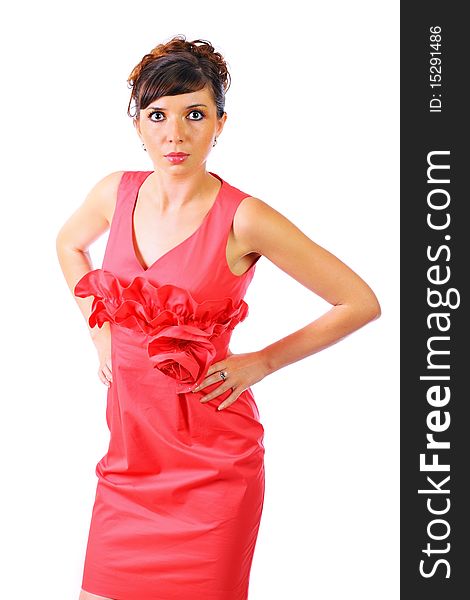 Young female model wearing red dress, studio shot. Young female model wearing red dress, studio shot