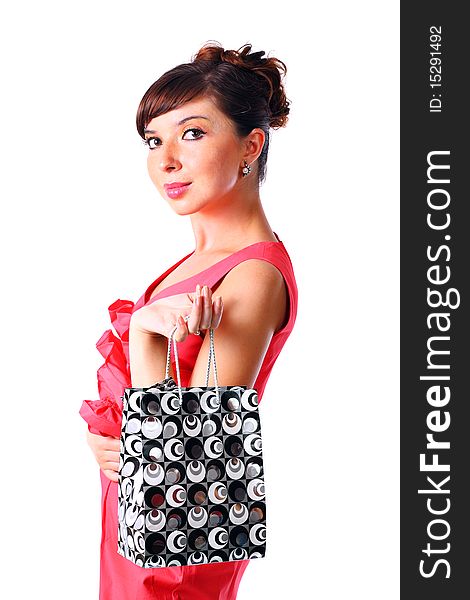 Young woman holding shopping bag