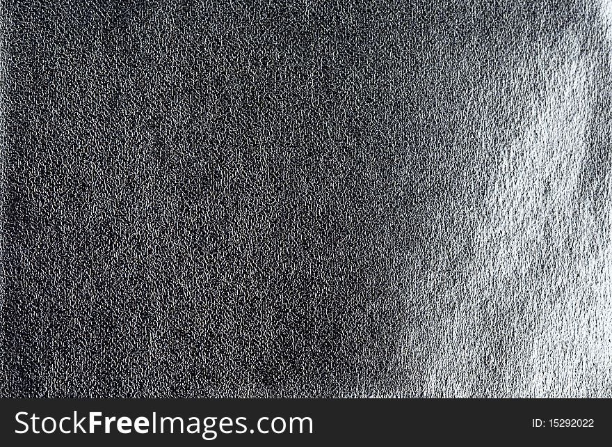 Dark synthetic leather textured background