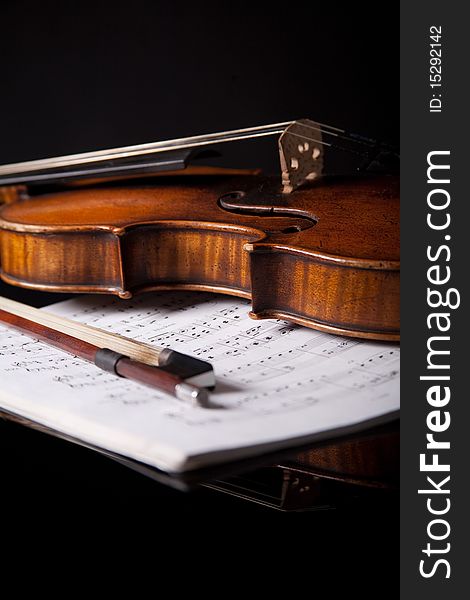 Beautiful old violin on dark background