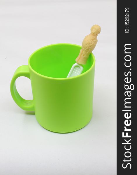 Cup and brush, isolated in the white background