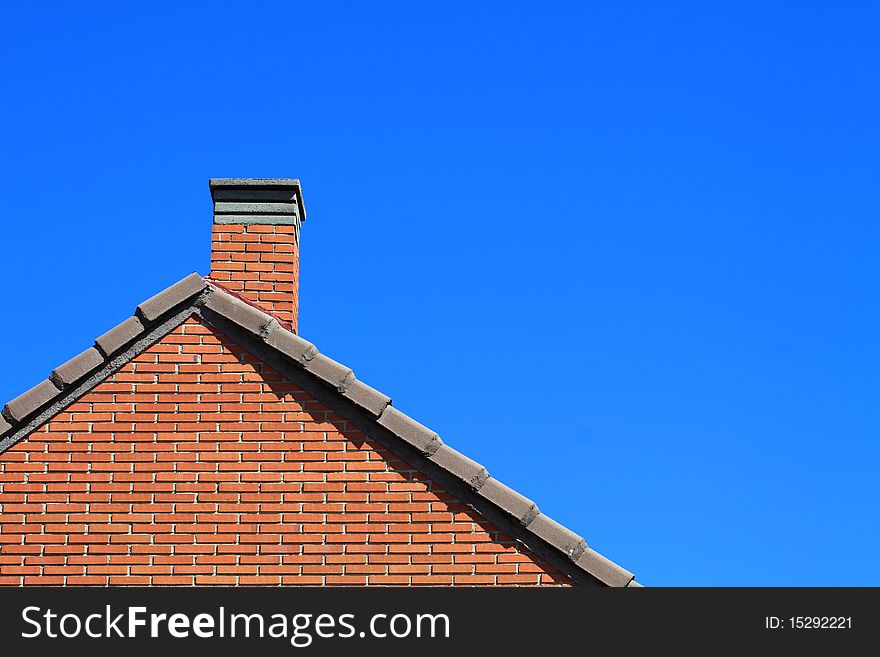 Brick house and blue sky. Brick house and blue sky.