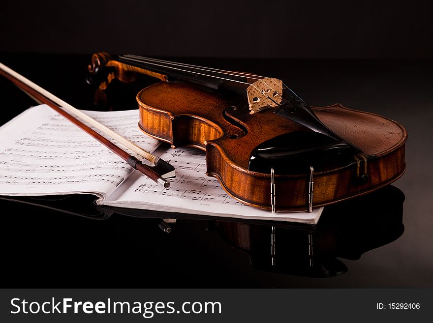 Beautiful old violin on dark background