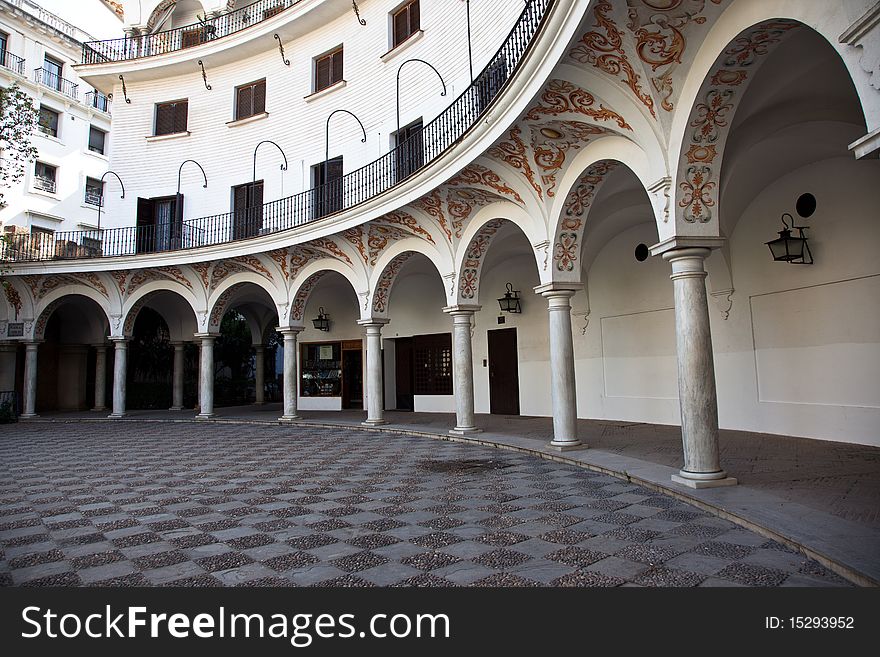 Detail of arches and columns in Plaza del Cabildo, Seville