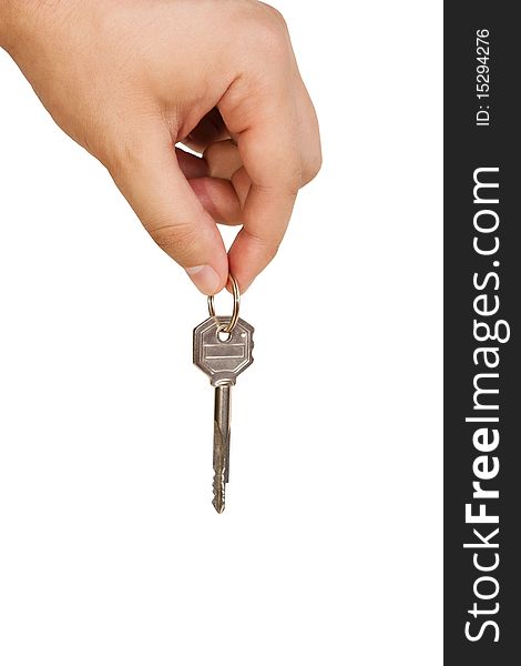 Man's hand with a key isolated over white background