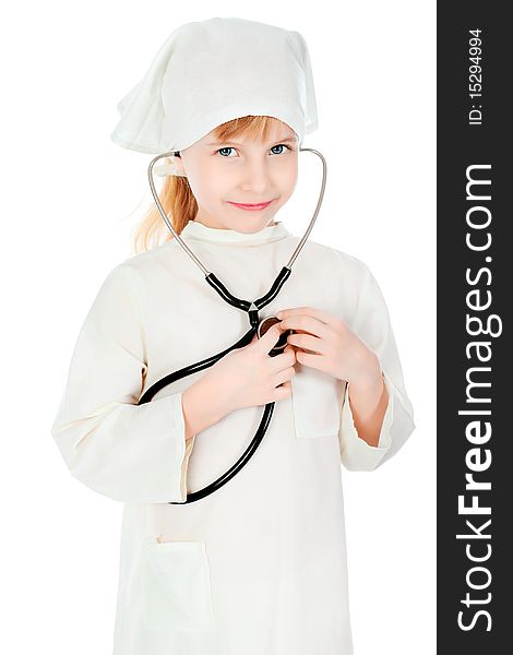 Shot of a little girl in a doctors uniform. Isolated over white background. Shot of a little girl in a doctors uniform. Isolated over white background.