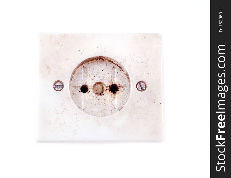 Old dirty plug socket isolated on white background. the socket is used and has some burning signs. Old dirty plug socket isolated on white background. the socket is used and has some burning signs.