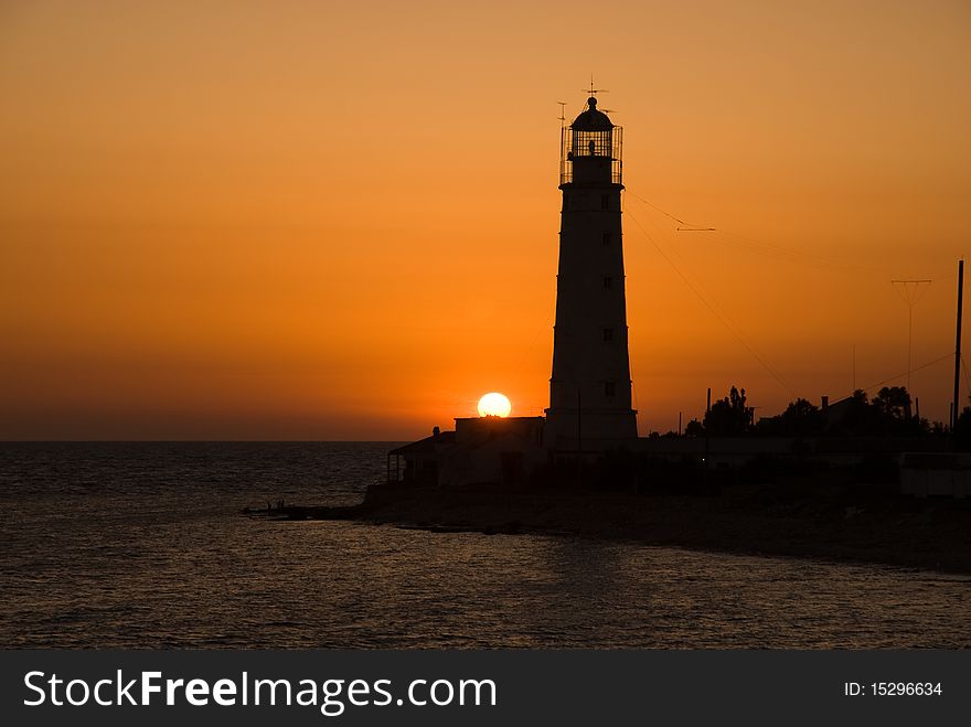 Bright Sea Sunset Above The Beacon