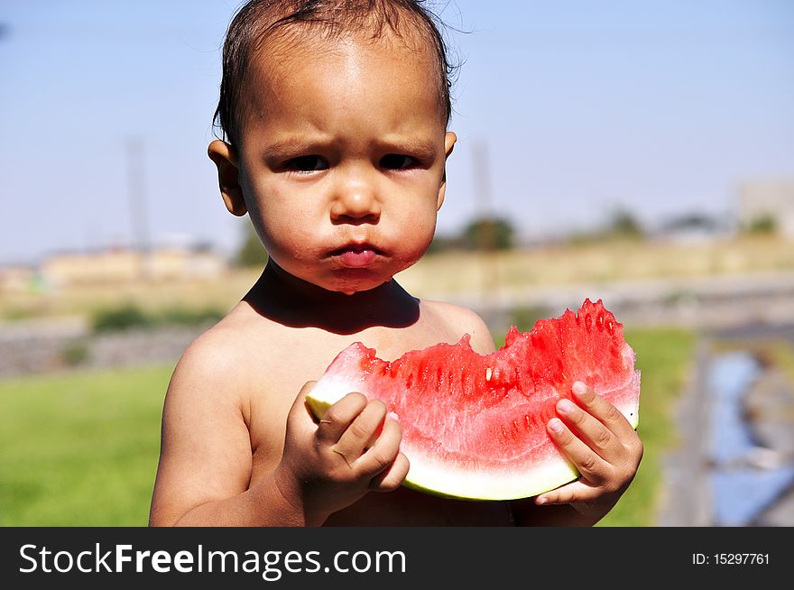 Little Boy Eating Watermelon