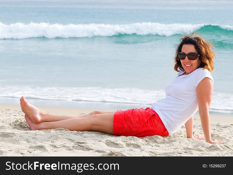 Relaxed And Happy Lady On The Beach