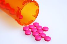 Pills And Container Stock Photo Pills And Container Stock Photo