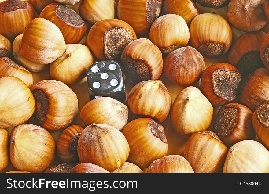 Nuts and dice abstract background