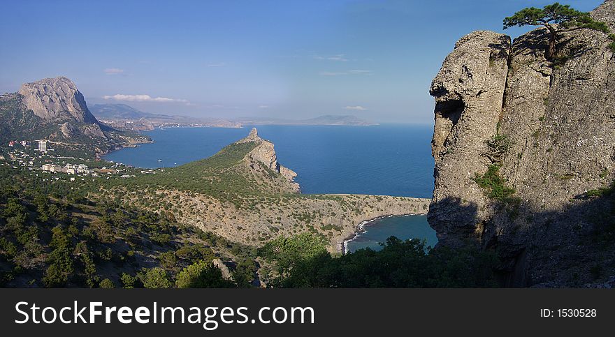 Panorama landscape with rocks and coastline of Novyj Svit reserve (Crimea, Ukraine). At the formerly times this places named us a paradise. Panorama landscape with rocks and coastline of Novyj Svit reserve (Crimea, Ukraine). At the formerly times this places named us a paradise.