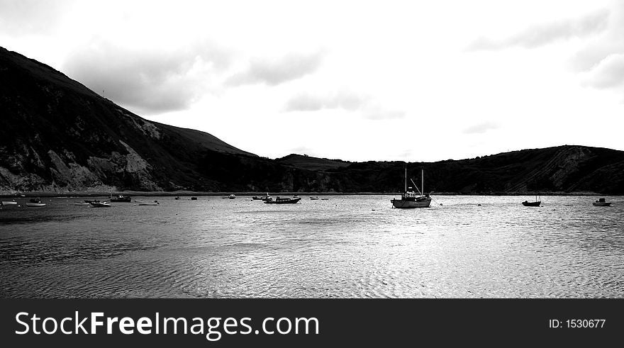 Moody shot of some boats on the sea. Moody shot of some boats on the sea