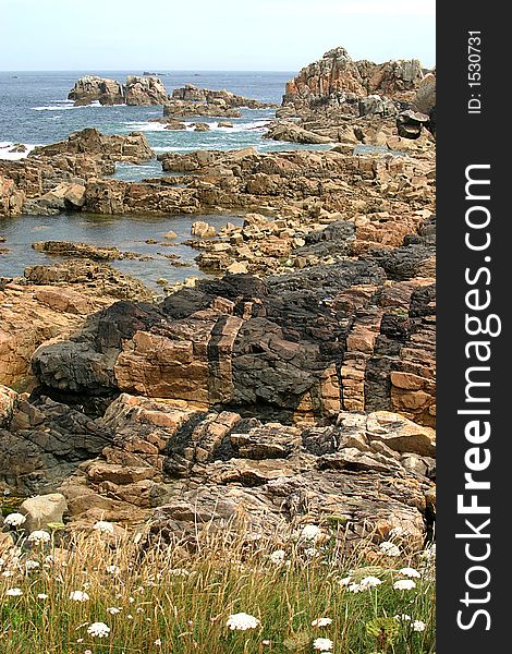 The whole of the northernmost stretch of the Breton coast, from BrÃ©hat to TrÃ©gastel, has loosely come to be known as the CÃ´te de Granit Rose. There are indeed great granite boulders scattered in the sea around the island of BrÃ©hat, and at the various headlands to the west, but the most memorable stretch of coast lies around Perros-Guirec, where the pink granite rocks are eroded into fantastic shapes. The whole of the northernmost stretch of the Breton coast, from BrÃ©hat to TrÃ©gastel, has loosely come to be known as the CÃ´te de Granit Rose. There are indeed great granite boulders scattered in the sea around the island of BrÃ©hat, and at the various headlands to the west, but the most memorable stretch of coast lies around Perros-Guirec, where the pink granite rocks are eroded into fantastic shapes.