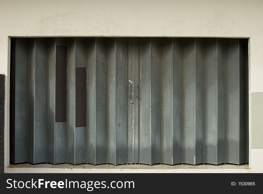 Urban decay-sliding metal door with patterns