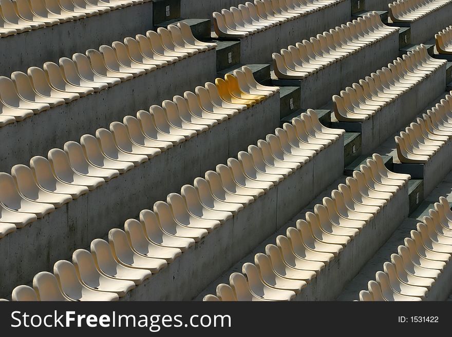 Empty stadium seats in white