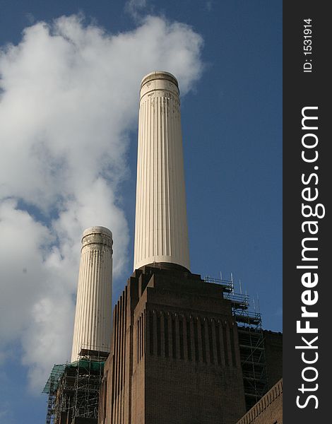 Inside Battersea Power Station, London, Energy, Architecture, coal, Sir Giles Gilbert Scott, 1929, 1939, Parkview International. The'smoke' is actually formed by passing clouds