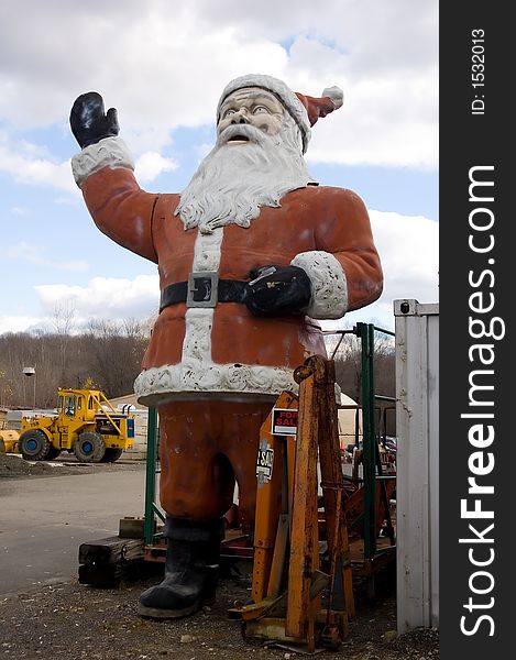 12 foot statue of Santa greeting customers at the local dump. 12 foot statue of Santa greeting customers at the local dump