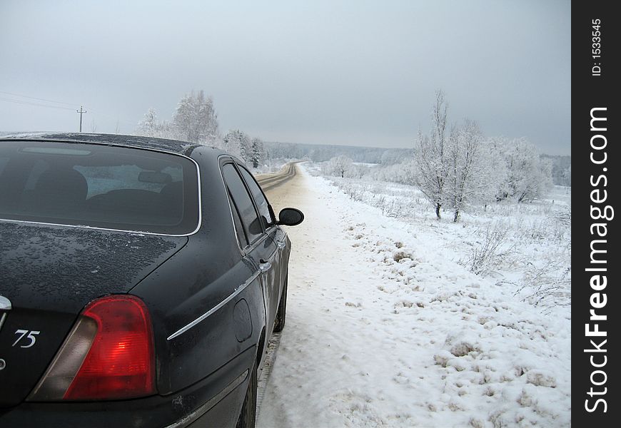 Car winter road wood snow snowbound tree dul way grey sky voyage