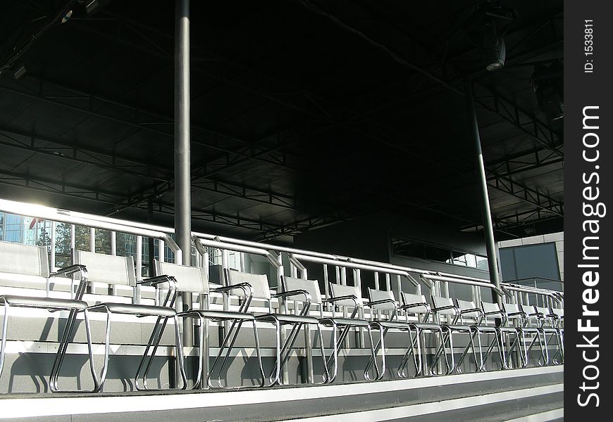 Empty seats in the audience area at an outdoor. Empty seats in the audience area at an outdoor