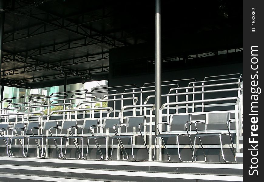 Empty seats in the audience area at an outdoor. Empty seats in the audience area at an outdoor