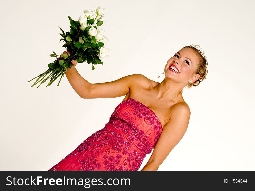 Young woman holding a bunch of white roses and loughing. Young woman holding a bunch of white roses and loughing