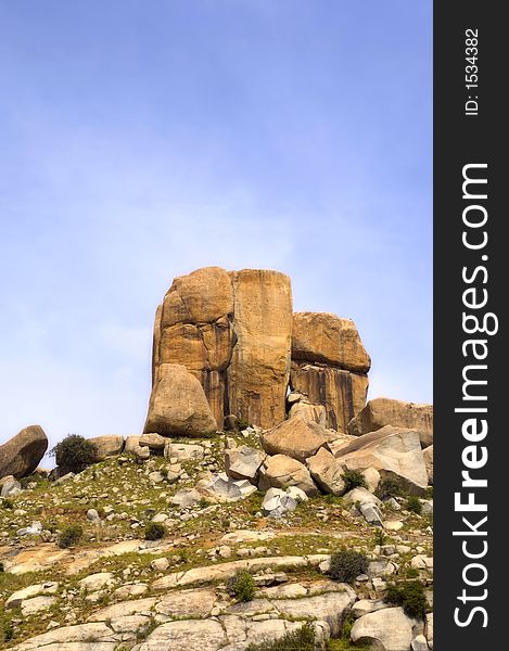 View Of Rock Formations On Top Of A Hill