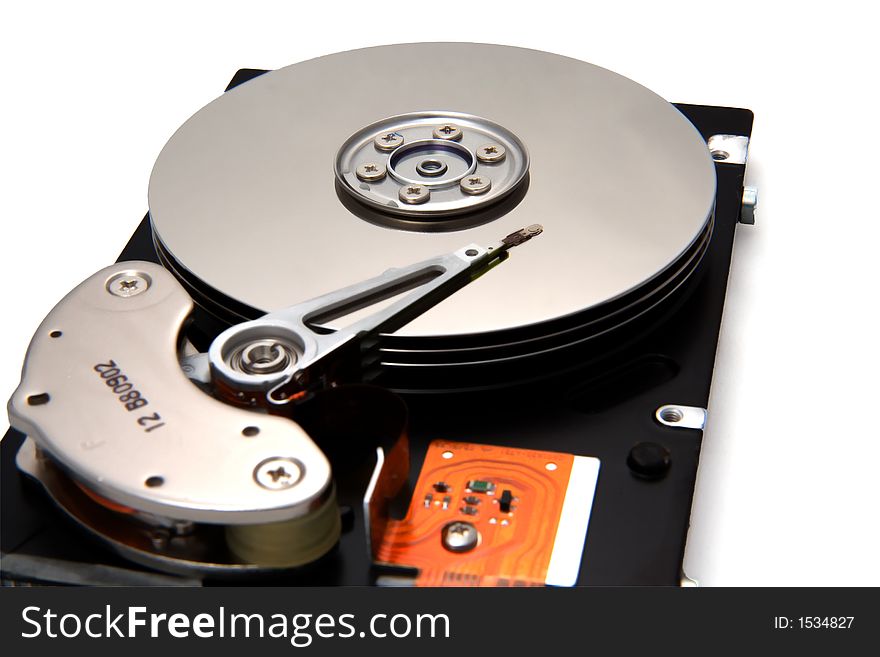 A multi-platter disk drive on white background.