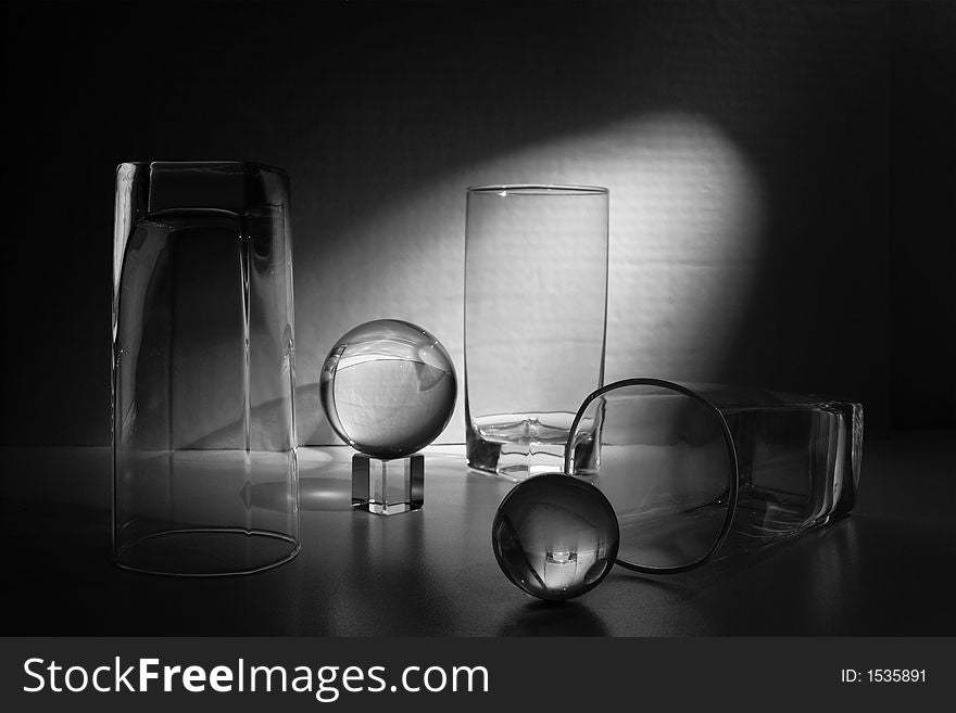 Still life with crystal ball and crystal goblet