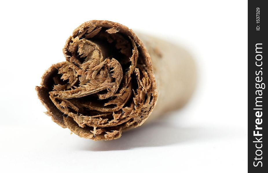 A strong close-up of a cinnamon stick.