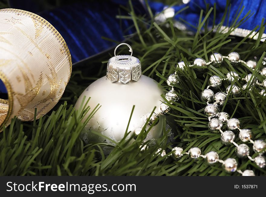 Blue christmas ornaments with christmas lights on christmas time. Blue christmas ornaments with christmas lights on christmas time