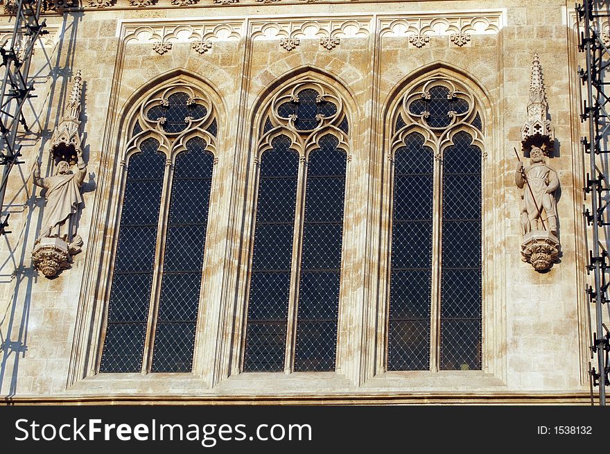 Ancient ornamental church windows on the sun