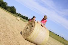 White People Having Fun On Hay Bales Royalty Free Stock Photography White People Having Fun On Hay Bales Royalty Free Stock Photography
