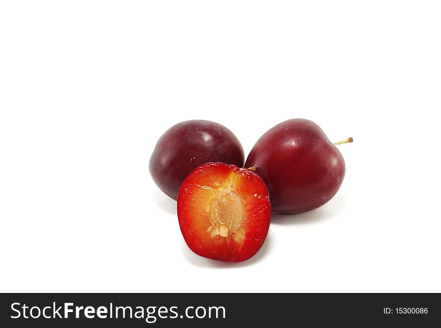 Plum is isolated on a white background. Plum is isolated on a white background