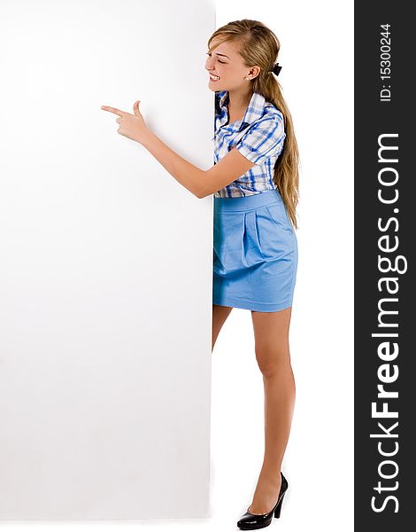 Business women standing behind the white board and pointing it indoor studio. Business women standing behind the white board and pointing it indoor studio