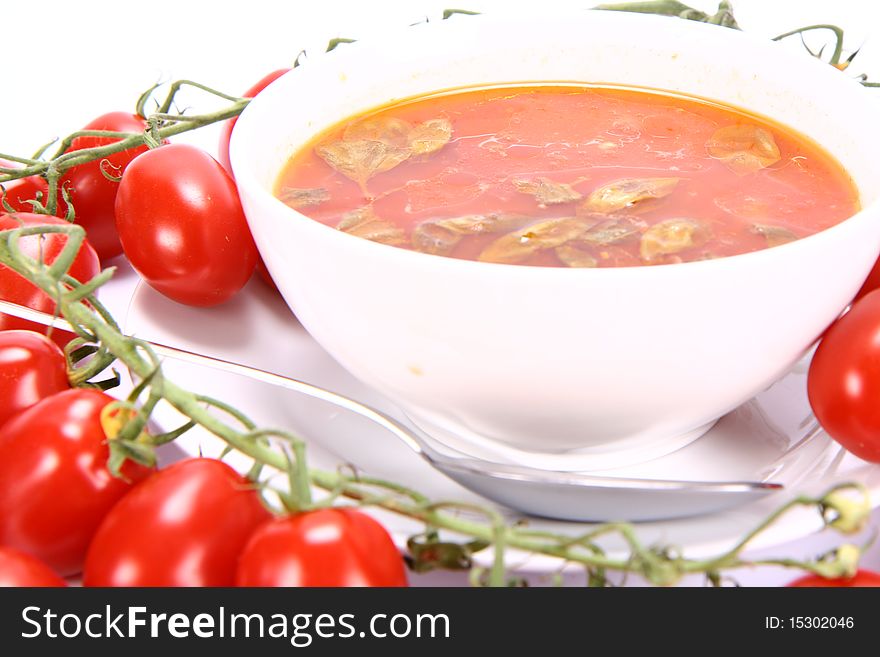 Tomato soup with basil leaves