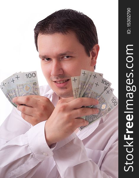 Adult caucasian businessman, with a lot of money in his hands. White background. Adult caucasian businessman, with a lot of money in his hands. White background.