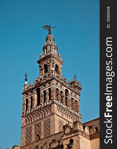 Detail of La Giralda in Seville's cathedral. Detail of La Giralda in Seville's cathedral.